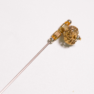 At Auction: Eight Gold Hat Stick Pins